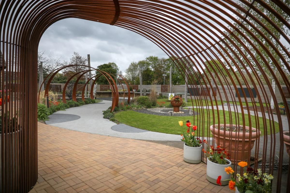 Treloar's Outdoor Learning centre viewed through the archway looking towards sensory garden