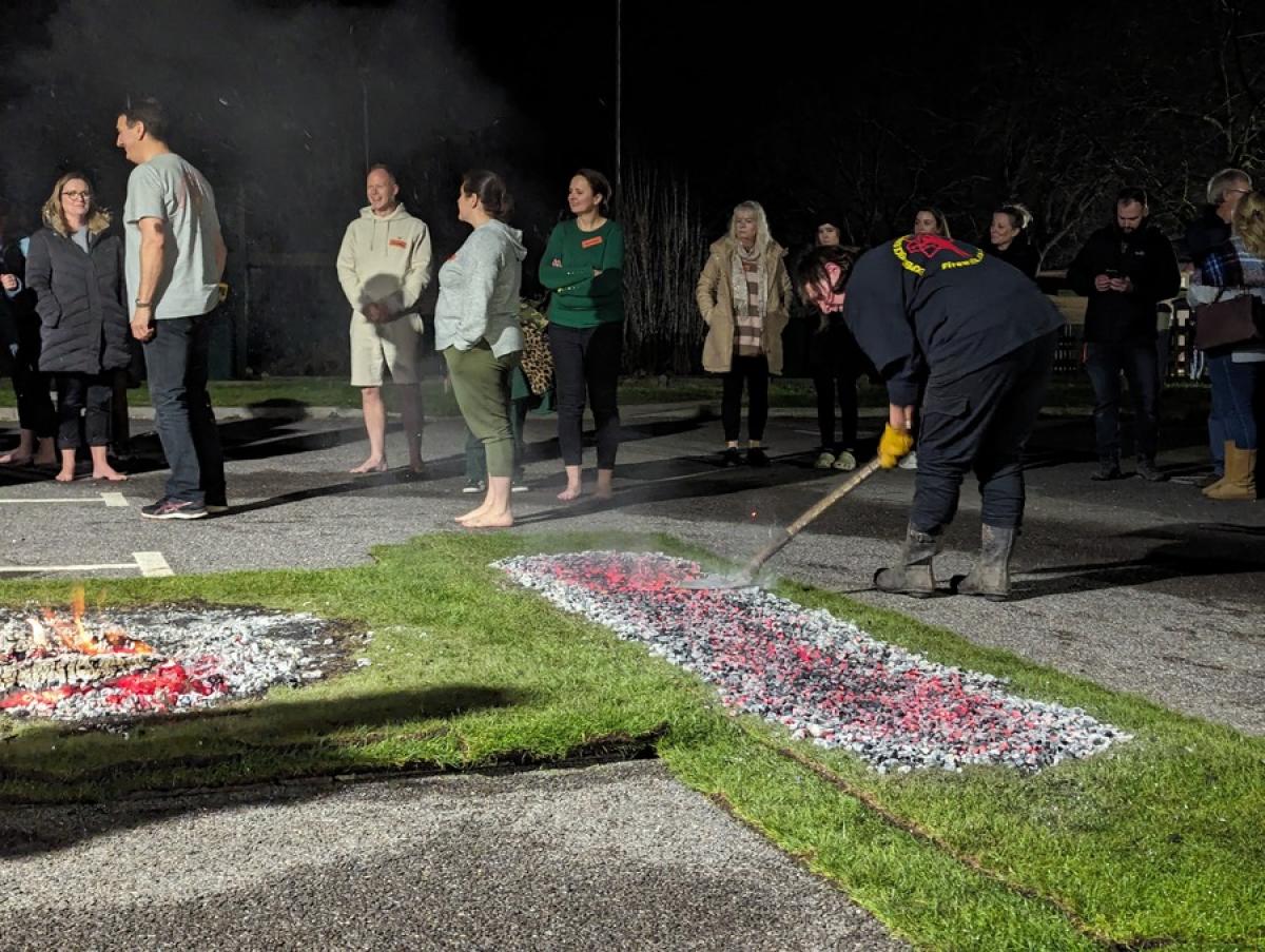 Hot coals being added to Firewalk