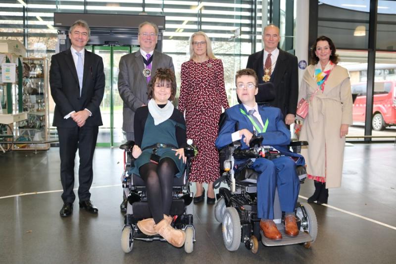 The group photo of the civic party with 2 Treloar's students and the Lord Mayor during the visit to Treloar's.