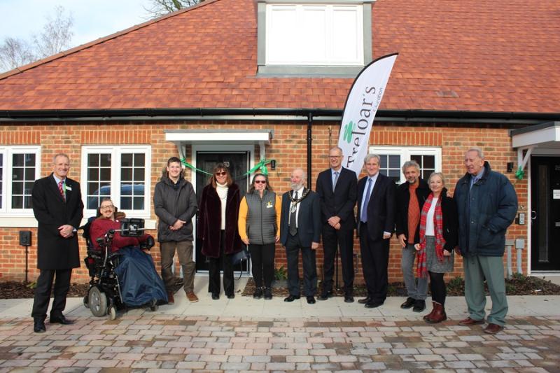 East Hampshire MP, Rt Hon Damian Hinds, together with Treloar's representatives at the opening of four new flats at the Rivermead Gardens housing development in Alton. 