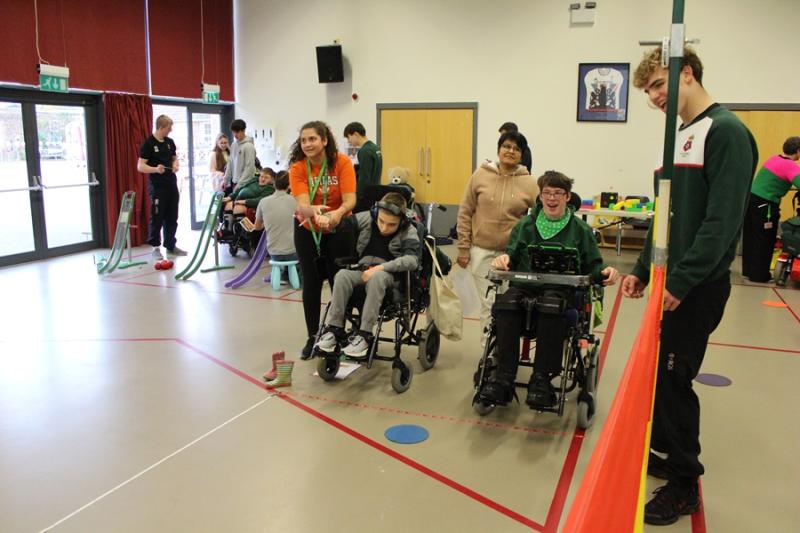 reloar School Students and Royal Grammar School taking part in sporting games - here welly wanging.