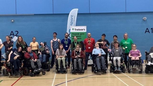 A group photo of Treloar's staff and students at Surrey Sports Park during the Natspec Games