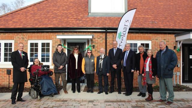 East Hampshire MP, Rt Hon Damian Hinds, together with Treloar's representatives at the opening of four new flats at the Rivermead Gardens housing development in Alton. 