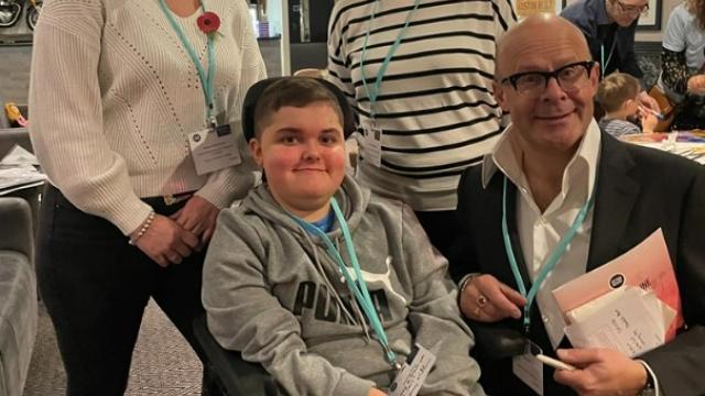 Harry Hill patron of Action Duchenne attending annual conference with Treloar College student.