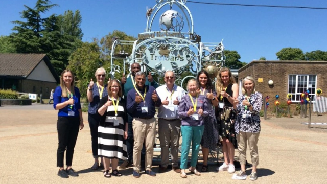 Group photo of Makaton trustees with Treloar's Speech and Language team members taken outside and everyone is showing thumbs up.