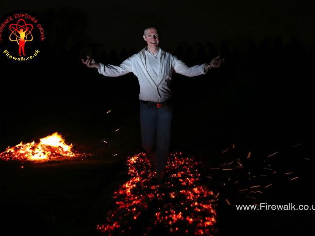 Man walking on fire