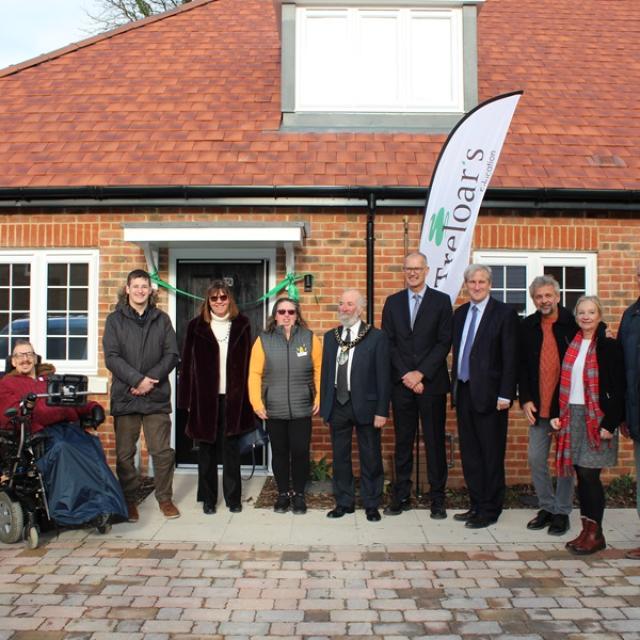 East Hampshire MP, Rt Hon Damian Hinds, together with Treloar's representatives at the opening of four new flats at the Rivermead Gardens housing development in Alton. 